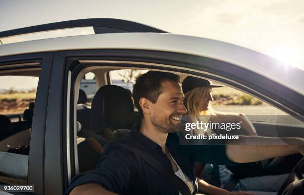 the whole world is in front of us - car driving away stock pictures, royalty-free photos & images