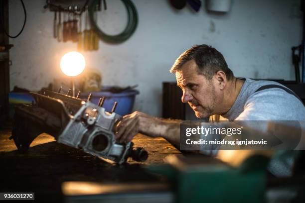 working late on car engine - cleaning inside of car stock pictures, royalty-free photos & images