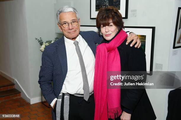 Photographer Jean Marie Perier and Anne Cassel attend the Jean Marie Perier's Exhibition at Photo 12 In Paris on March 21, 2018 in Paris, France.