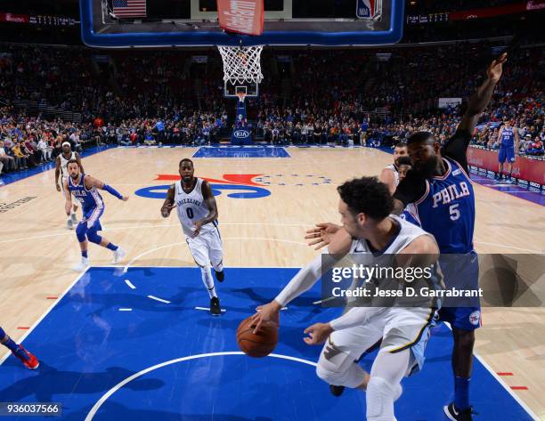 Dillon Brooks of the Memphis Grizzlies passes the ball in midair to JaMychal Green against the Philadelphia 76ers at Wells Fargo Center on March 21,...