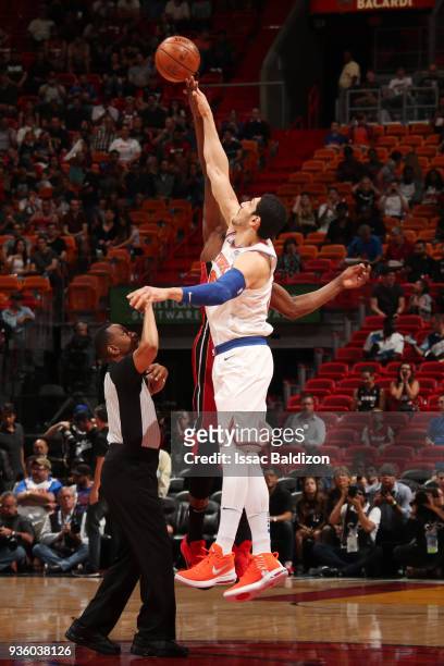 Enes Kanter of the New York Knicks jumps for tip off to start the game against the Miami Heat on March 21, 2018 at American Airlines Arena in Miami,...