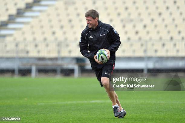 Assistant Coach Ronan O'Gara looks to pass the ball during the Crusaders Super Rugby captain's run at AMI Stadium on March 22, 2018 in Christchurch,...