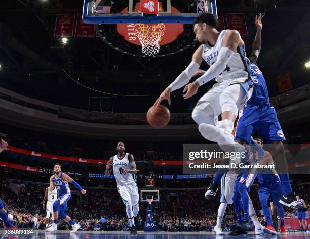 Dillon Brooks of the Memphis Grizzlies passes the ball in midair to JaMychal Green against the Philadelphia 76ers at Wells Fargo Center on March 21,...