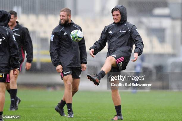 George Bridge kicks the ball as Braydon Ennor looks on during the Crusaders Super Rugby captain's run at AMI Stadium on March 22, 2018 in...