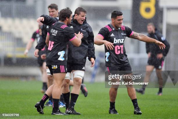 Ben Funnell, Tom Sanders and Codie Taylor react during the Crusaders Super Rugby captain's run at AMI Stadium on March 22, 2018 in Christchurch, New...