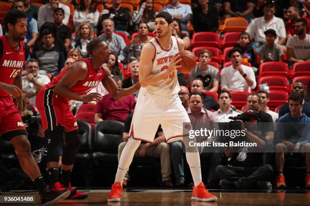 Enes Kanter of the New York Knicks handles the ball during the game against the Miami Heat on March 21, 2018 at American Airlines Arena in Miami,...