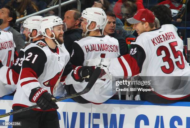 Derek Stepan of the Arizona Coyotes celebrates his first period goal against the Buffalo Sabres during an NHL game on March 21, 2018 at KeyBank...