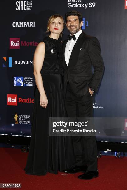 Anna Ferzetti and Pierfrancesco Favino walk the red carpet ahead of the 62nd David Di Donatello awards ceremony on March 21, 2018 in Rome, Italy.