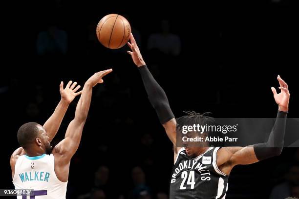 Rondae Hollis-Jefferson of the Brooklyn Nets blocks a shot by Kemba Walker of the Charlotte Hornets in the first quarter during their game at...