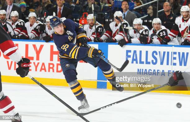 Rasmus Ristolainen of the Buffalo Sabres fires a first period shot against the Arizona Coyotes during an NHL game on March 21, 2018 at KeyBank Center...