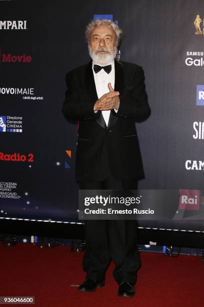 Director Gianni Amelio walks a red carpet ahead of the 62nd David Di Donatello awards ceremony on March 21, 2018 in Rome, Italy.