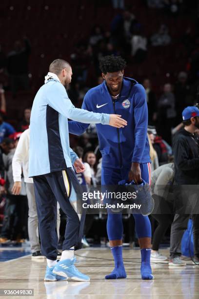 Chandler Parsons of the Memphis Grizzlies and Joel Embiid of the Philadelphia 76ers hug after the game between the two teams on March 21, 2018 at the...