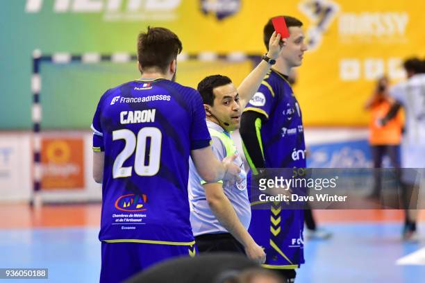 Johann Caron of Massy receives a red card for a four on Youssef Ben Ali of Ivry during the Lidl Starligue match between Massy and Ivry on March 21,...