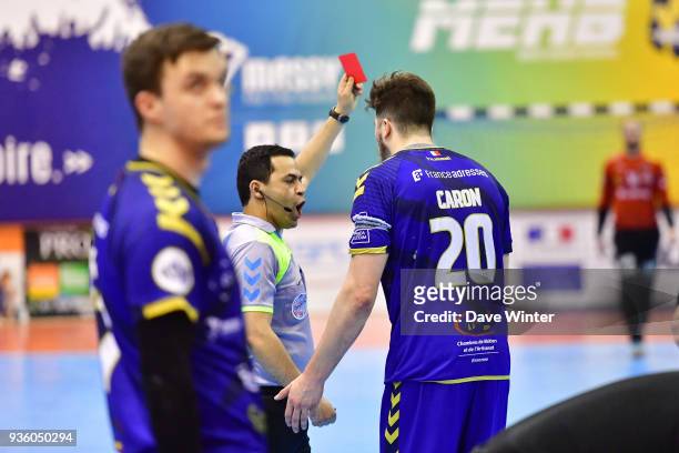 Johann Caron of Massy receives a red card for a four on Youssef Ben Ali of Ivry during the Lidl Starligue match between Massy and Ivry on March 21,...