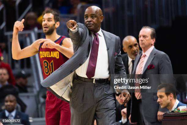 Interim head coach Larry Drew signals to his players during the second half against the Toronto Raptors at Quicken Loans Arena on March 21, 2018 in...