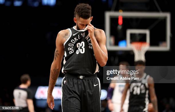 Allen Crabbe of the Brooklyn Nets reacts late in the fourth quarter against the Charlotte Hornets during their game at Barclays Center on March 21,...