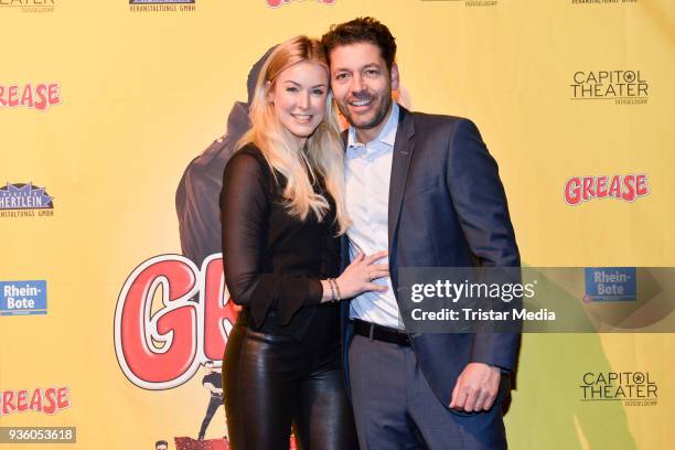 Nina Ensmann and her boyfriend Marc Demmig attend the 'Grease' premiere on March 21, 2018 in Duesseldorf, Germany.