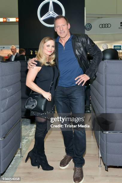 Regina Halmich and Ralf Moeller during 'Flotte - Der Branchentreff' at the exhibition Dusseldorf on March 21, 2018 in Dusseldorf, Germany.