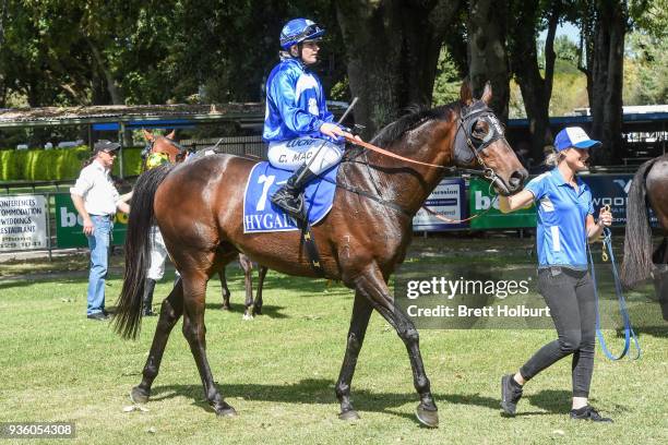 Chelsea MacFarlane returns to the mounting yard on Apocalypto after winning the Woodside Park Stud BM58 Handicap at Kyneton Racecourse on March 21,...