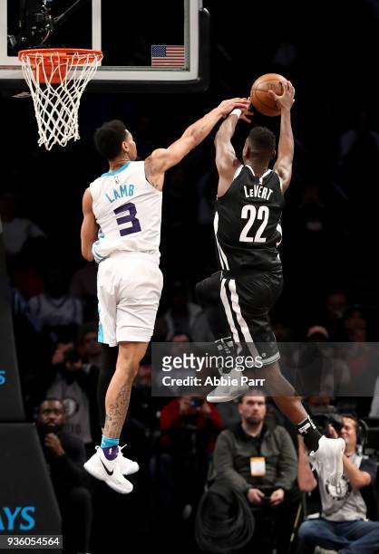 Caris LeVert of the Brooklyn Nets takes a shot against Jeremy Lamb of the Charlotte Hornets in the third quarter during their game at Barclays Center...
