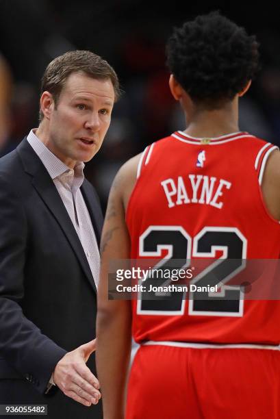 Head coach Fred Hoiberg of the Chicago Bulls gives instructions to Cameron Payne during a game against the Denver Nuggets at the United Center on...