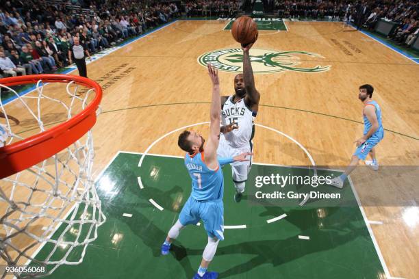 Shabazz Muhammad of the Milwaukee Bucks shoots against Sam Dekker of the Los Angeles Clippers during the NBA game on March 21, 2018 at the BMO Harris...