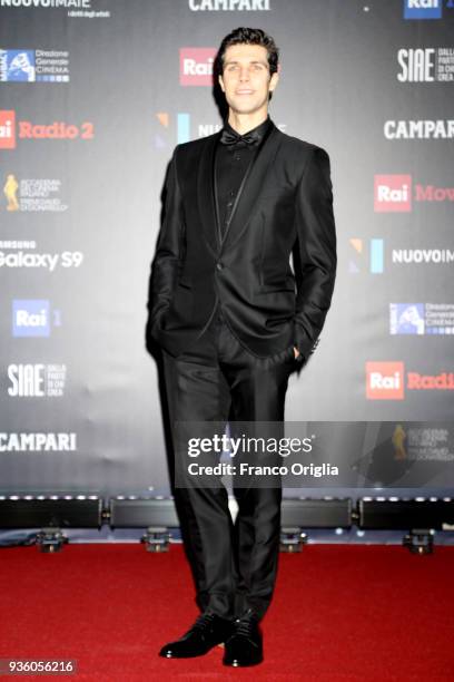 Roberto Bolle walks a red carpet ahead of the 62nd David Di Donatello awards ceremony on March 21, 2018 in Rome, Italy.