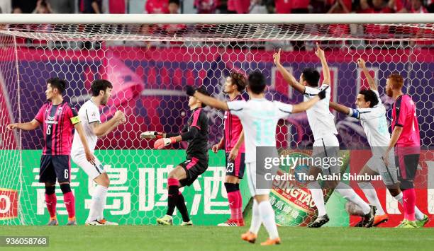 Buriram United players celebrate their opening goal during the AFC Champions League Group G game between Cerezo Osaka and Buriram United at Nagai...