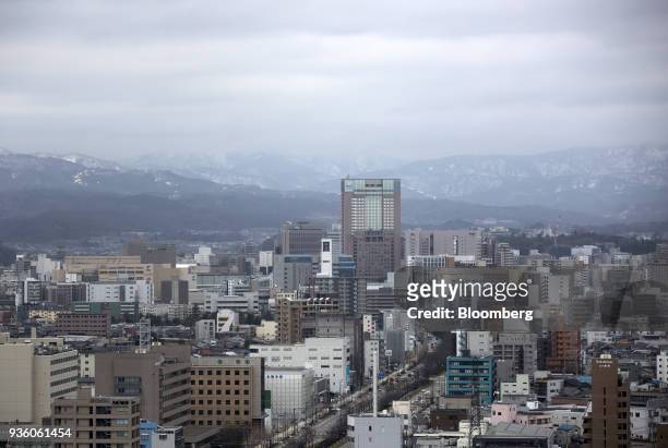 Buildings stand seen from an observatory in Kanazawa, Japan, on Tuesday March 20, 2018. Japan is scheduled to release February's Consumer Price Index...