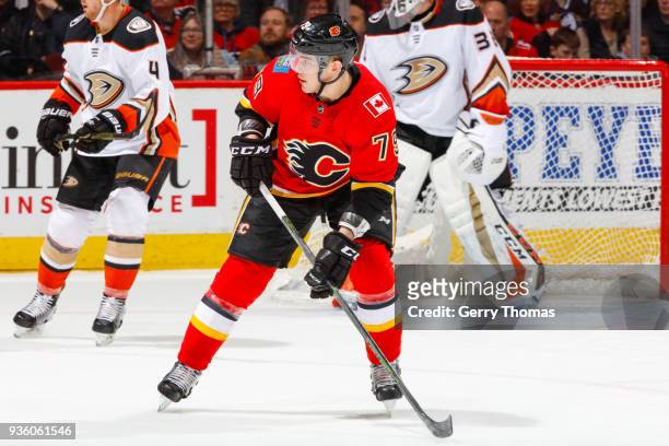 Micheal Ferland of the Calgary Flames looks for a pass in an NHL game on March 21, 2018 at the Scotiabank Saddledome in Calgary, Alberta, Canada.