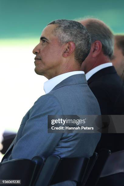 Barack Obama listens to speeches during a powhiri at Government House on March 22, 2018 in Auckland, New Zealand. It is the former US president's...