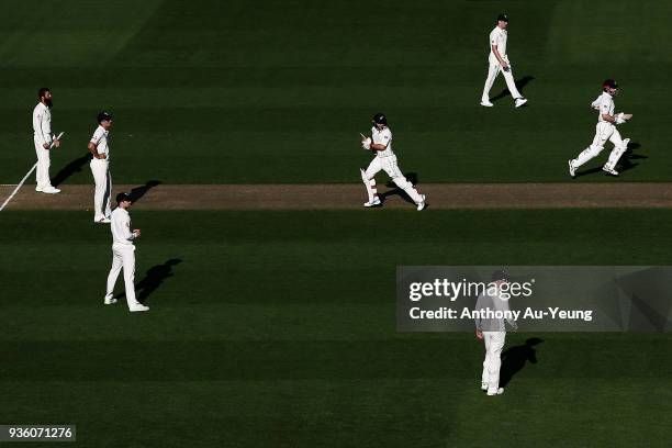 Tom Latham and Kane Williamson of New Zealand make their runs during day one of the First Test match between New Zealand and England at Eden Park on...
