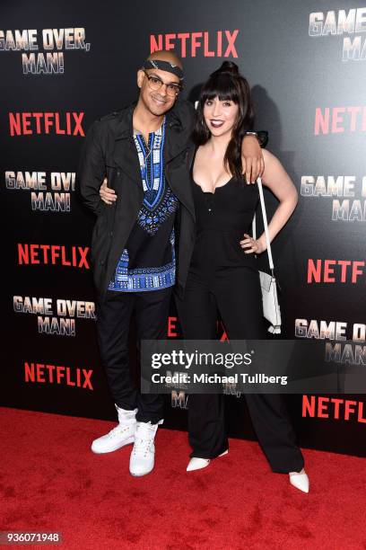 Yassir Lester and guest attend the premiere of Netflix's "Game Over, Man!" at Regency Village Theatre on March 21, 2018 in Westwood, California.