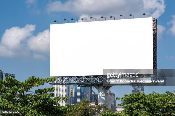 road with lanterns and large blank billboard at evening in city : bangkok : thailand - bangkok road stock pictures, royalty-free photos & images