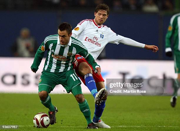 Marcus Berg of Hamburg and Steffen Hofmann of Wien compete for the ball during the UEFA Europa League Group C match between Hamburger SV and SK Rapid...