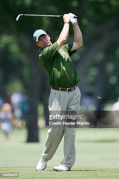 Woody Austin hits a shot during the final round of the Crowne Plaza Invitational at Colonial Country Club on May 31, 2009 in Ft. Worth, Texas.