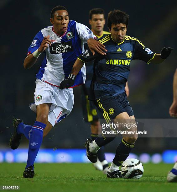 Deco of Chelsea competes for the ball with Steven Nzonzi of Blackburn Rovers during the Carling Cup Quarter Final match between Blackburn Rovers and...