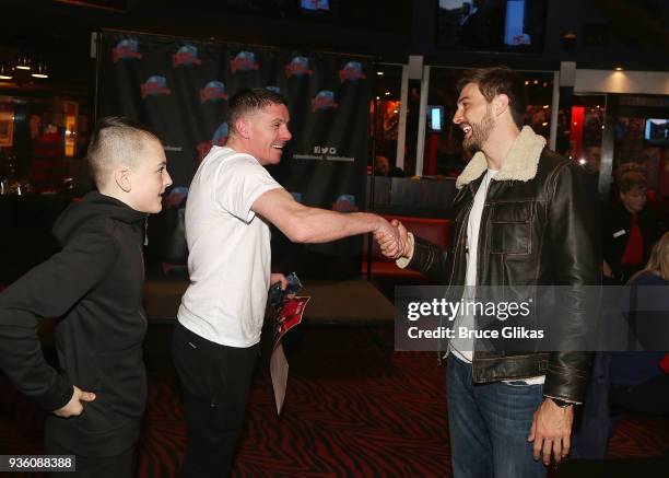 Jake Allyn poses with fans as he promotes the BET television show "The Quad" at Planet Hollywood Times Square on March 21, 2018 in New York City.