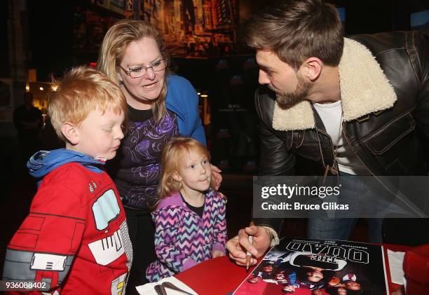 Jake Allyn poses with fans as he promotes the BET television show "The Quad" at Planet Hollywood Times Square on March 21, 2018 in New York City.