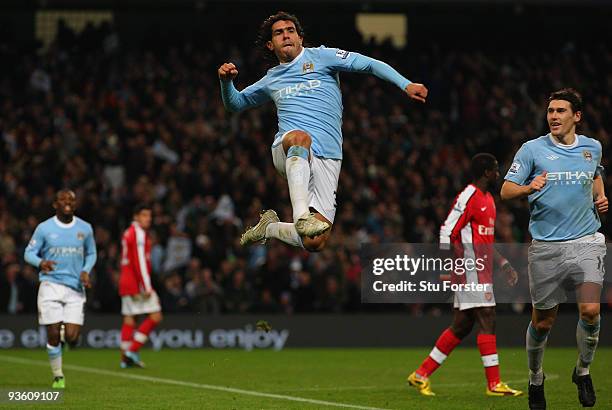 Carlos Tevez of Man City celebrates his goal during the Carling Cup quarter final match between Manchester City and Arsenal at City of Manchester...