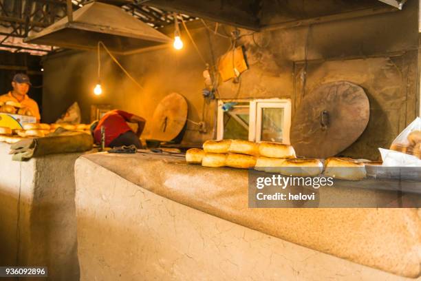 backing traditional  flat bread - tandoor oven stock pictures, royalty-free photos & images