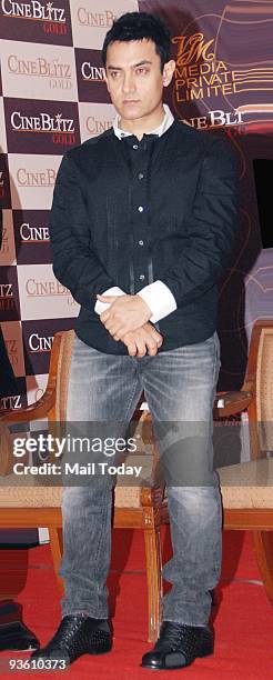 Actor Aamir Khan during the launch of Cine Blitz magazine's new book 'Love and Longing in Hindi Cinema', in Mumbai on Monday, November 30, 2009.