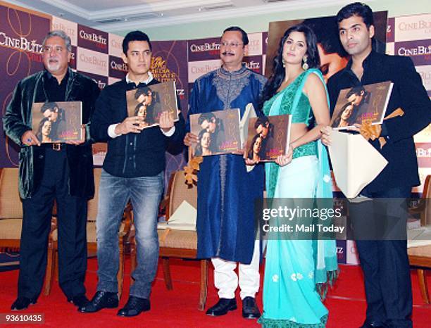 Vijay Mallya, Aamir Khan, Guru Dutt's son Arun, Katrina Kaif and Karan Johar during the launch of Cine Blitz magazine's new book 'Love and Longing in...