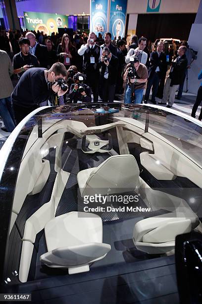 The new three-seat Honda P-NUT with a clear roof is debuted during press preview days of the 2009 LA Auto Show at the Los Angeles Convention Center...