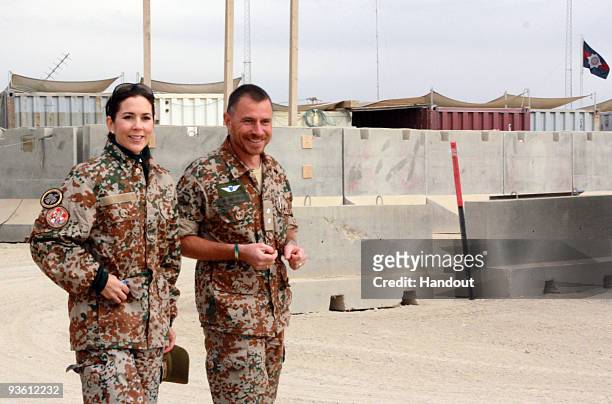 In this handout photo provided by The Danish Ministry of Defence, HRH Crown Princess Mary of Denmark visits Danish troops on November 30, 2009 in...