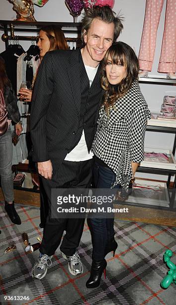 Guitarist John Taylor and Gela Nash-Taylor of Juicy Couture attend the Juicy Couture children's tea party in aid of Mothers 4 Children, at the Juicy...