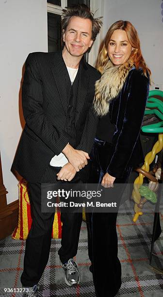 Guitarist John Taylor and model Yasmin Le Bon attend the Juicy Couture children's tea party in aid of Mothers 4 Children, at the Juicy Couture Store...