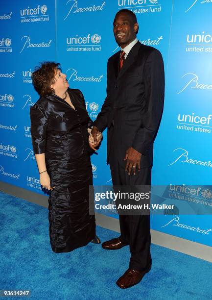 Fund for UNICEF President Caryl Stern and Basketball player Dikembe Mutombo attend the 2009 UNICEF Snowflake Ball at Cipriani 42nd Street on December...