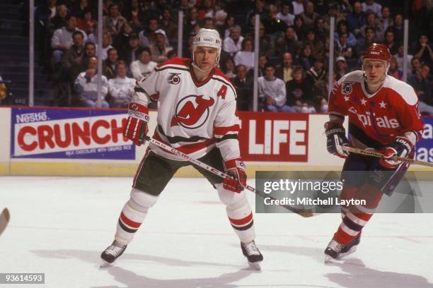 Scott Stevens of the New Jersey Devils looks on during a NHL hockey game against the Washington Capitals on Janaury 24, 1992 at Capitol Centre in...