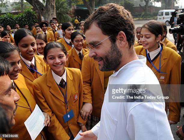 Congress General Secretary and Amethi MP Rahul Gandhi, meets students, who came to visit Parliament, in New Delhi on Tuesday.